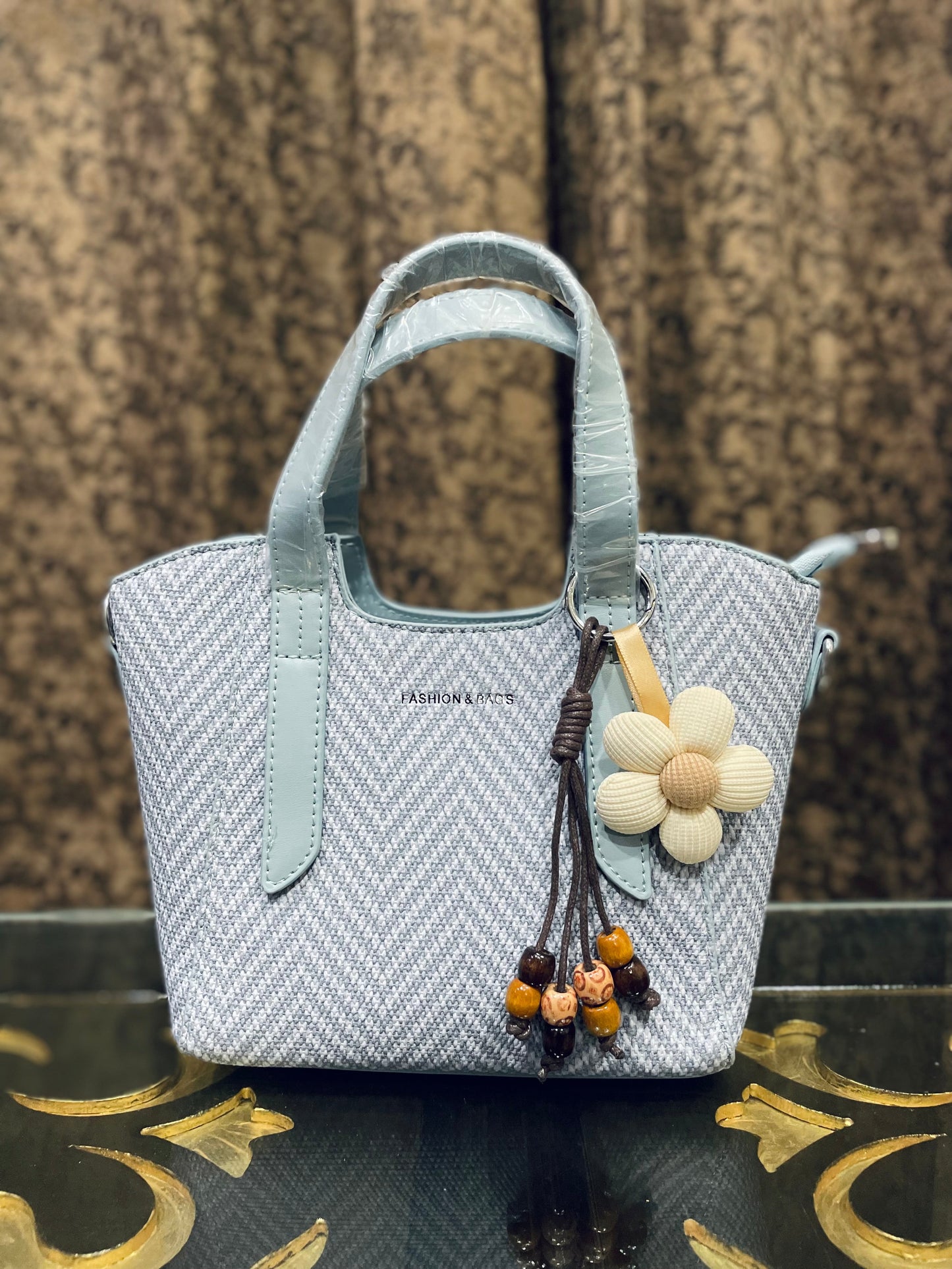 Powder Blue Mini Handbag with Flower Charm & Sling Belt