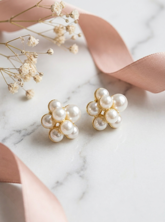 Pearl Bloom Studs on marble with pink silk ribbon and dried baby's breath