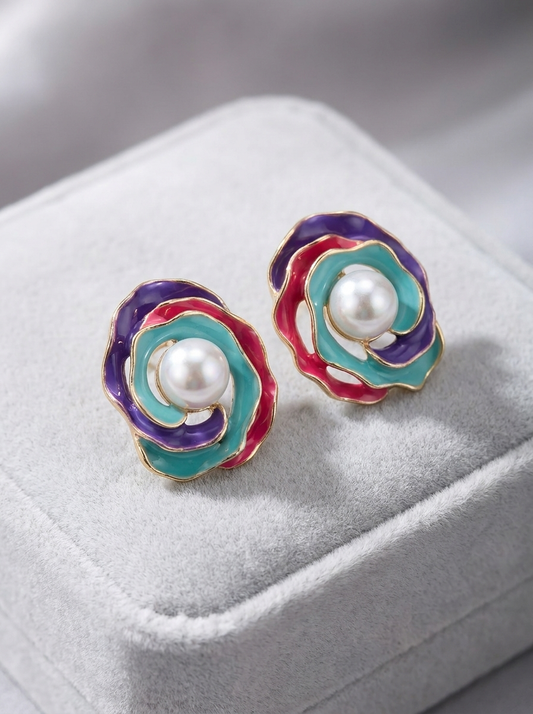 Multicolour enamel rose pearl stud earrings on blue velvet fabric
