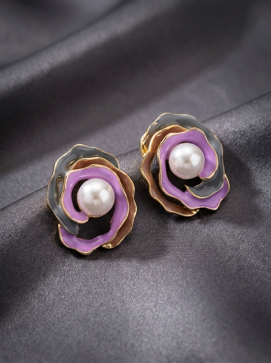 Model wearing pink and grey enamel rose pearl stud earrings with pink embroidered kurta